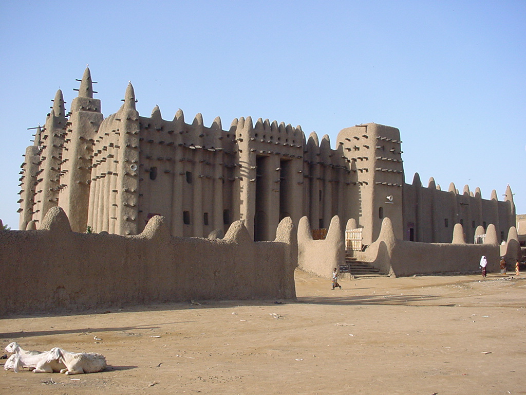 An image of an ancient mosque built from Rônier palm tree wooden beams and mudbricks in the town of Djenné, Mali.